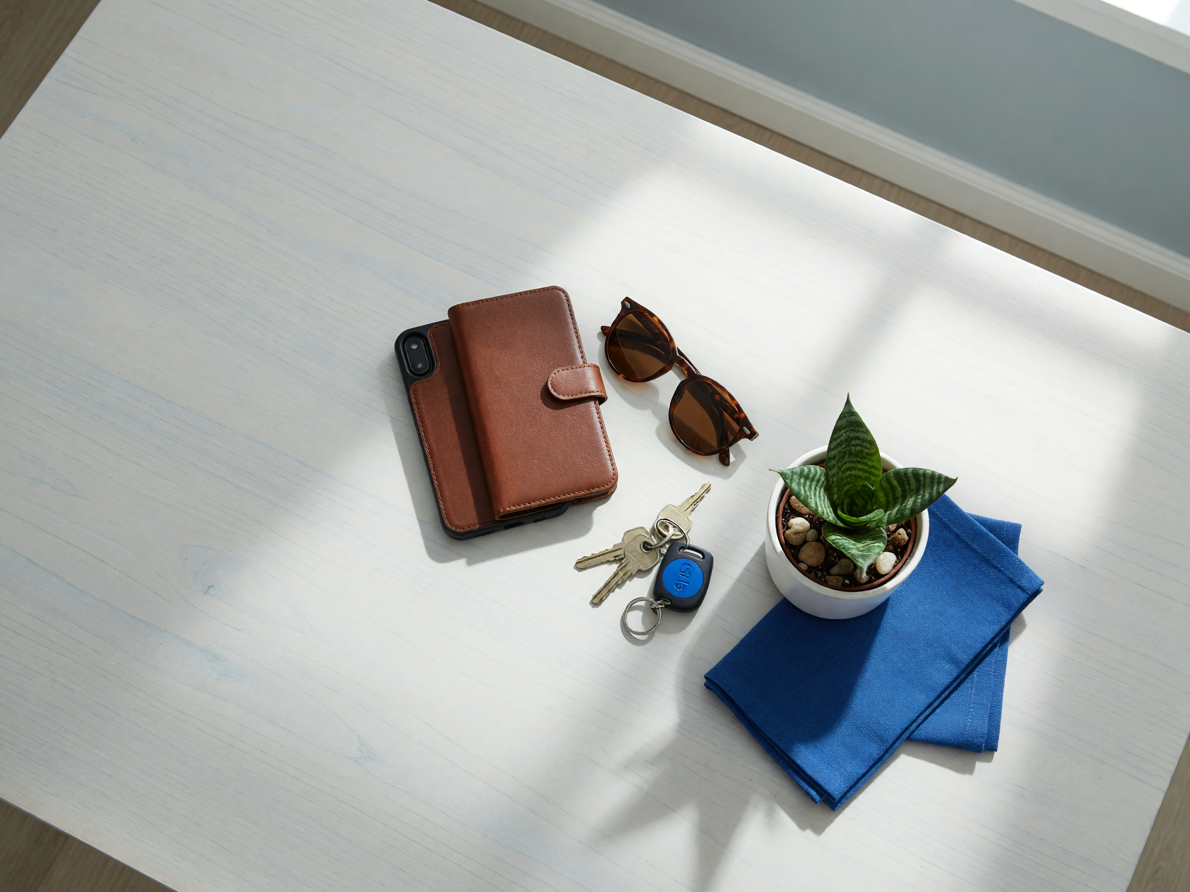lifestyle entryway scene with leather wallet phone case